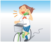 携帯電話で通話しながら走る自転車の画像