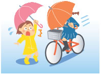 傘をさして走行する自転車の画像